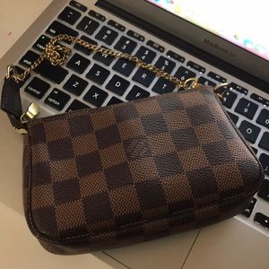 Authentic Louis Vuitton Mini Pochette